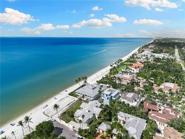 an aerial view of beach and ocean