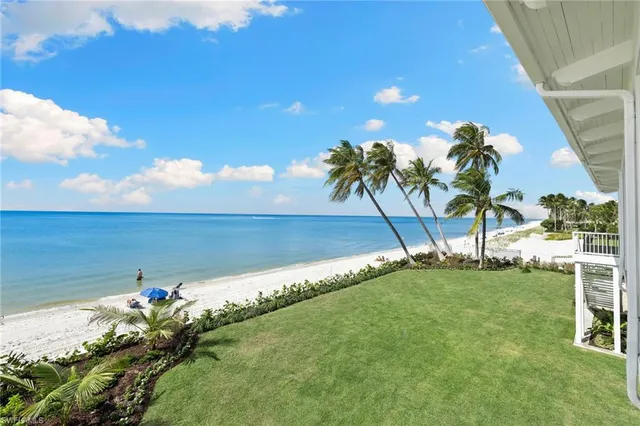 a view of a lake with a big yard