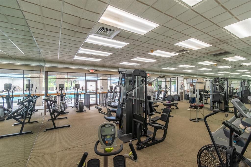 8156 Southwest 108th Ln Road Ocala, FL 34481 - Photo 40 of 50 a view of a room with gym equipment