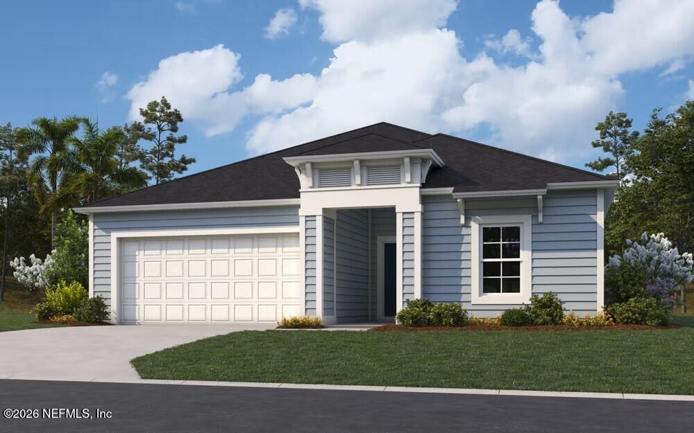 355 Silver Lily Way St. Augustine, FL 32092 - Photo 1 of 2 a front view of a house with a garden
