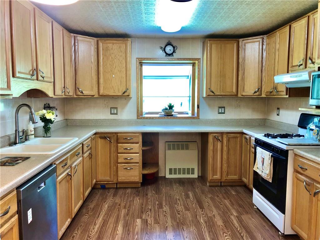 665 Martin Road Belle Vernon, PA 15012 - Photo 5 of 25 Plenty of cabinetry and counter space for mealtime prep.