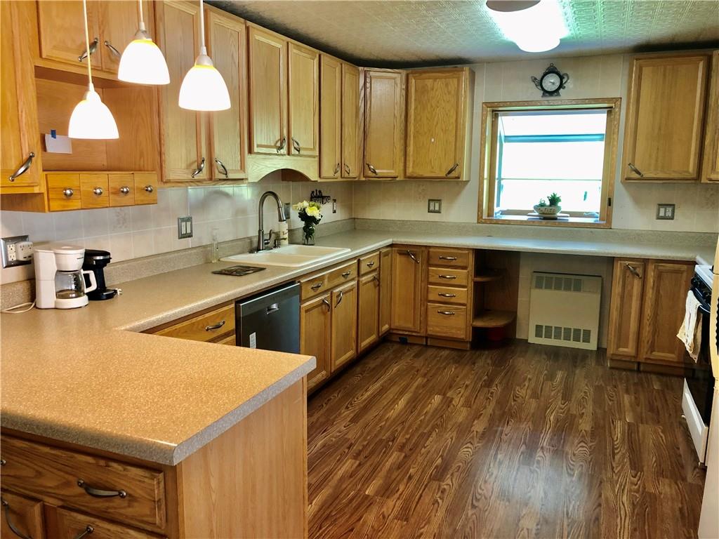 665 Martin Road Belle Vernon, PA 15012 - Photo 6 of 25 Another View of the Kitchen with New Laminate Flooring.