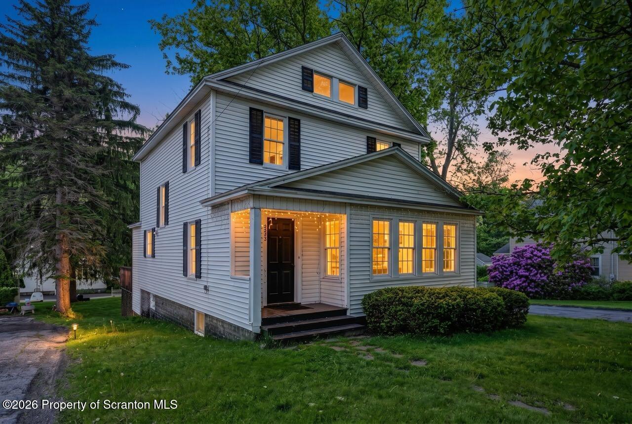 502 Layton Road Clarks Summit, PA 18411 - Photo 2 of 42 a front view of a house with a yard and outdoor seating