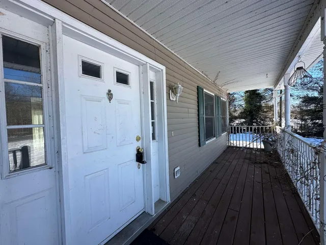 a view of a house with wooden floor