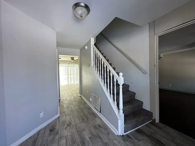 a view of hallway with stairs