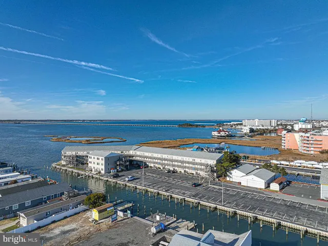 a view of a room with water heater and wooden floor