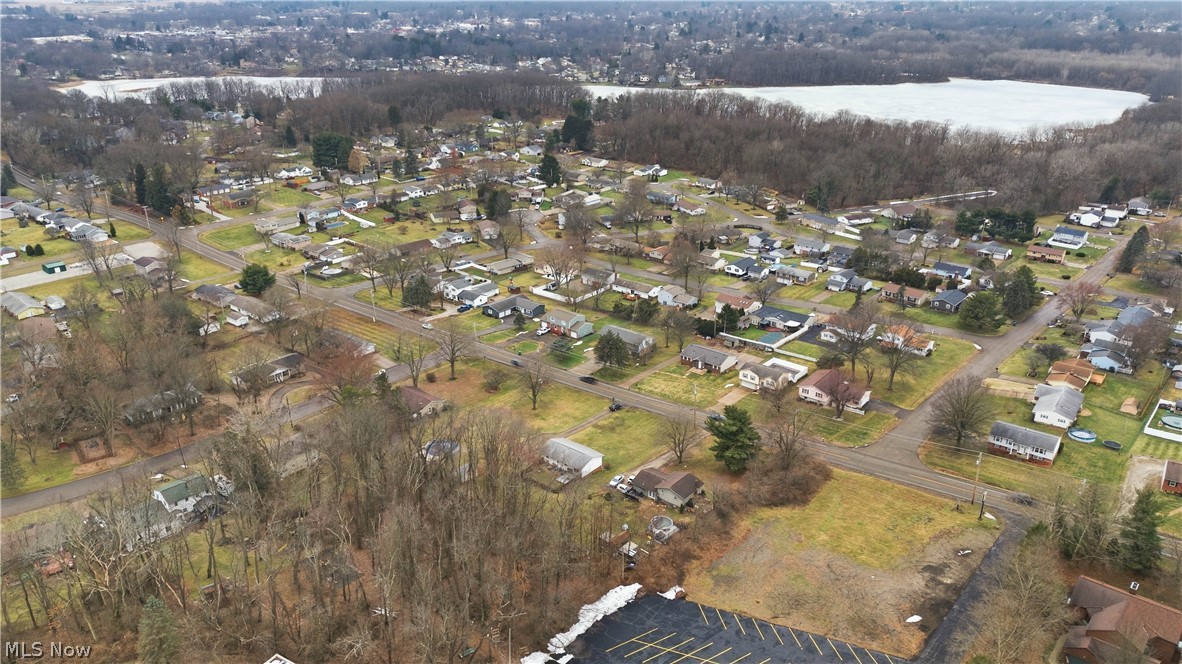 702 Perry Drive Northwest Canton, OH 44708 - Photo 33 of 46 Aerial overview of property's location with nearby suburban area and a large body of water