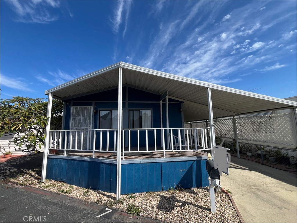 a backyard of a house with a deck
