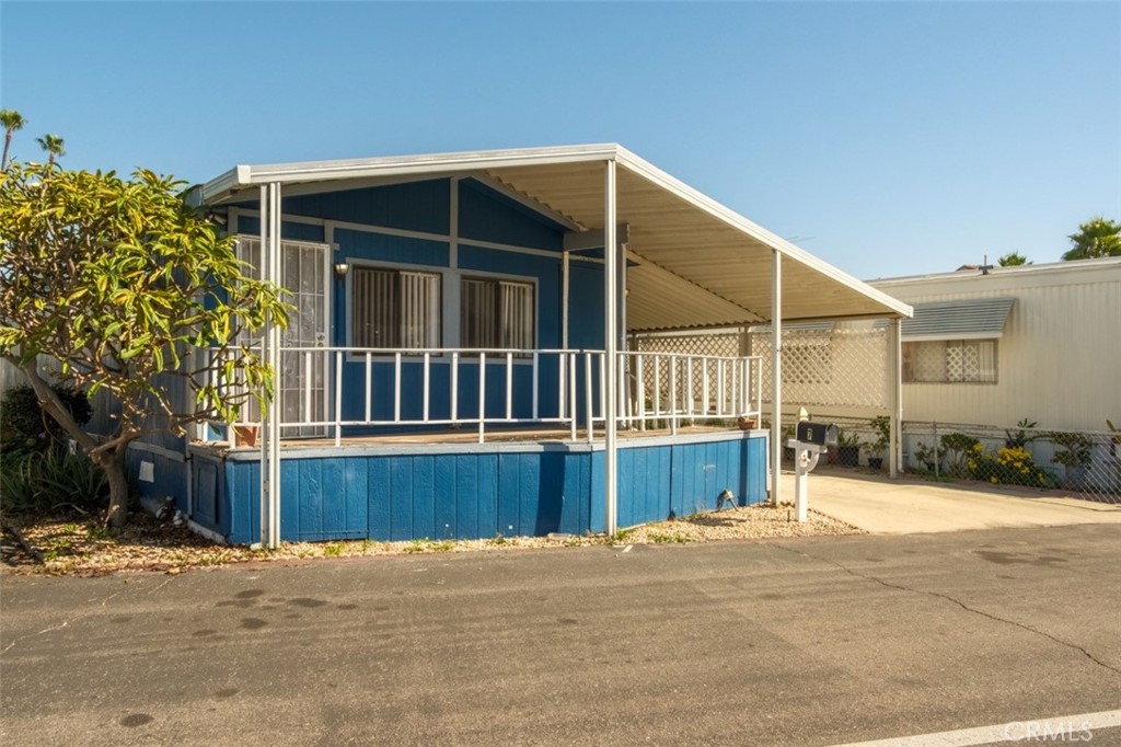 432 South Harbor Boulevard, Unit 7 Santa Ana, CA 92704 - Photo 33 of 35 a view of a house with a snow in a yard
