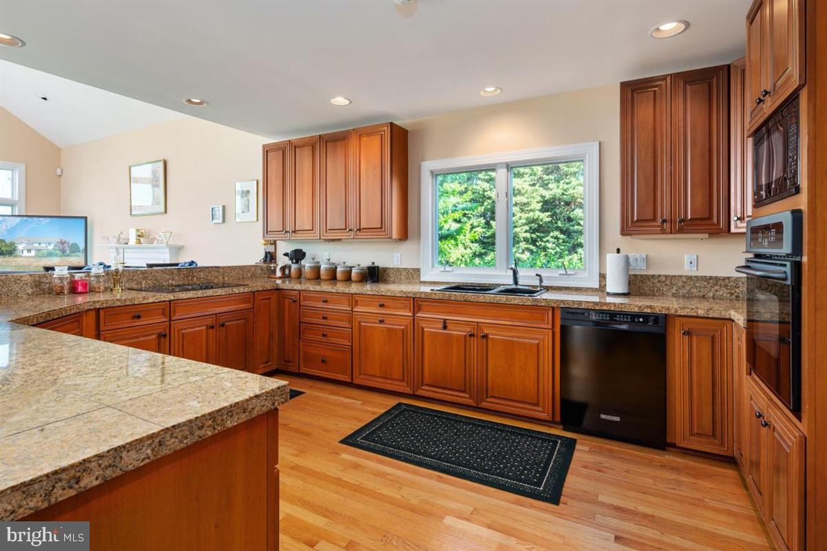 2838 Cox Neck Road Chester, MD 21619 - Photo 7 of 66 Gourmet Kitchen w/ Cherry Cabinets & HWD Floors