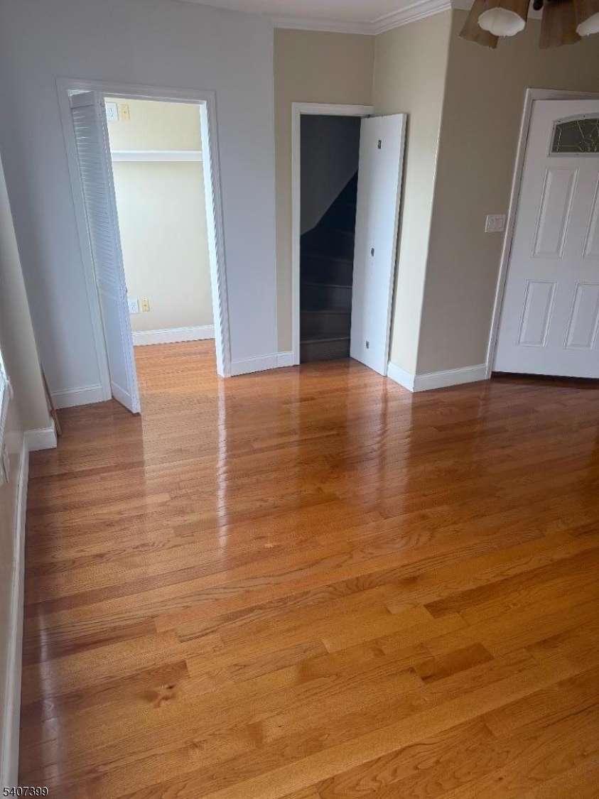 28 Reid Street, Unit 2 Elizabeth, NJ 07201 - Photo 3 of 19 a view of a room with wooden floor