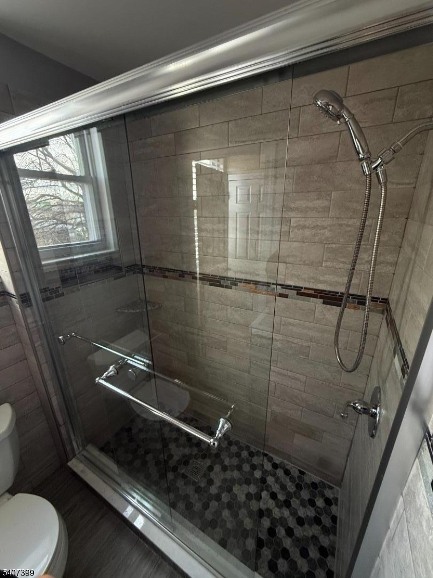 28 Reid Street, Unit 2 Elizabeth, NJ 07201 - Photo 10 of 19 a bathroom with a shower