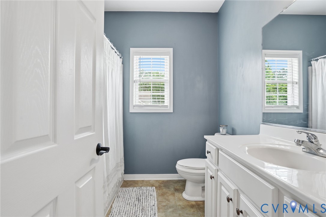 5305 Wellington Ridge Road Richmond, VA 23231 - Photo 43 of 67 Bathroom featuring a white vanity with an integrat