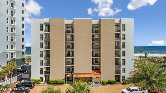 a front view of a building with a street