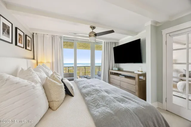 a bathroom with a granite countertop sink mirror and a shower