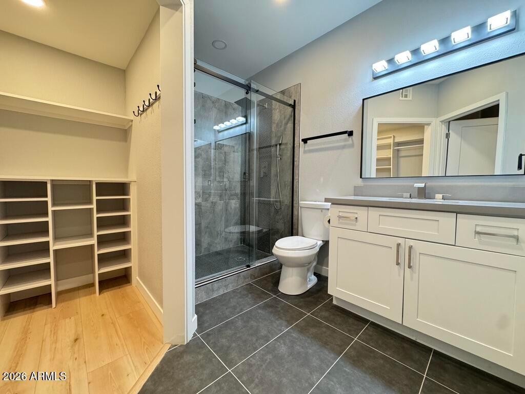 1701 East Colter Street, Unit 431 Phoenix, AZ 85016 - Photo 16 of 23 a bathroom with a sink toilet and shower