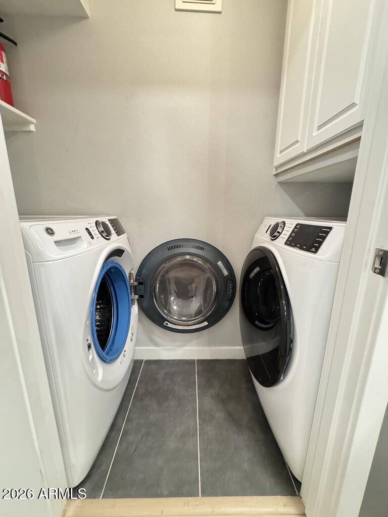 1701 East Colter Street, Unit 431 Phoenix, AZ 85016 - Photo 21 of 23 a utility room with dryer and washer