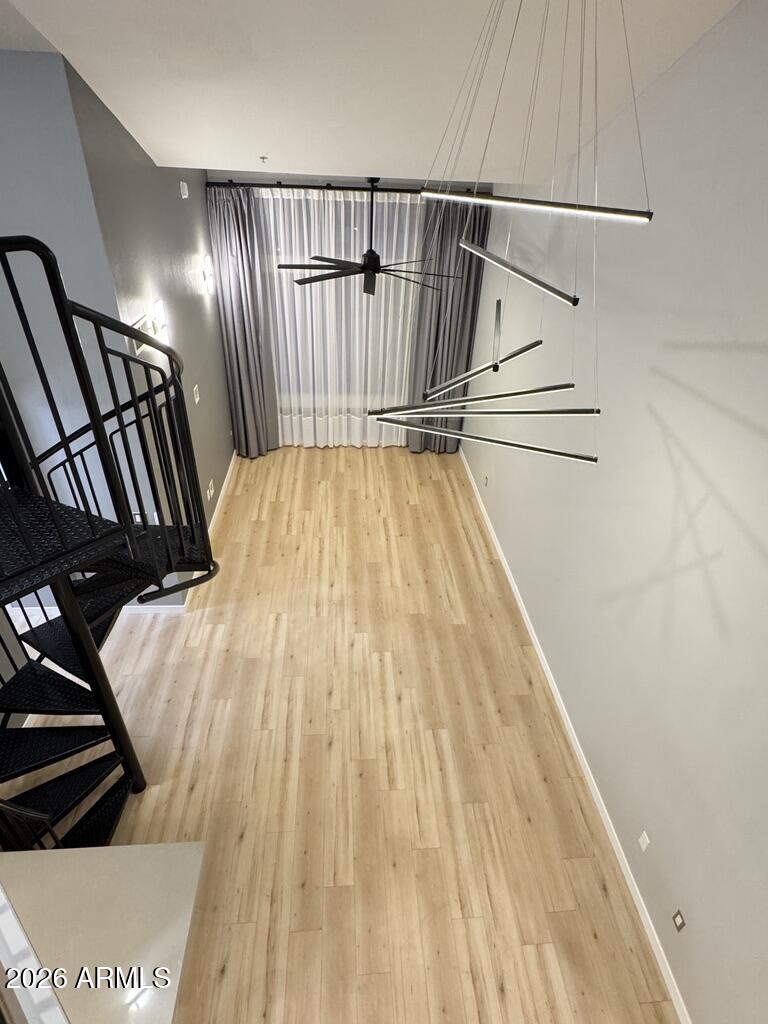 1701 East Colter Street, Unit 431 Phoenix, AZ 85016 - Photo 23 of 23 a view of wooden floor