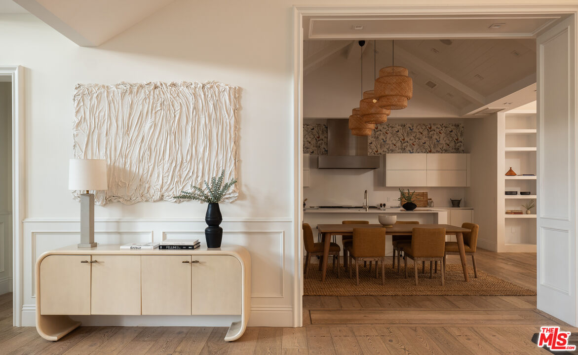 17204 Rancho Street Encino, CA 91316 - Photo 2 of 30 a kitchen with a sink and a stove top oven