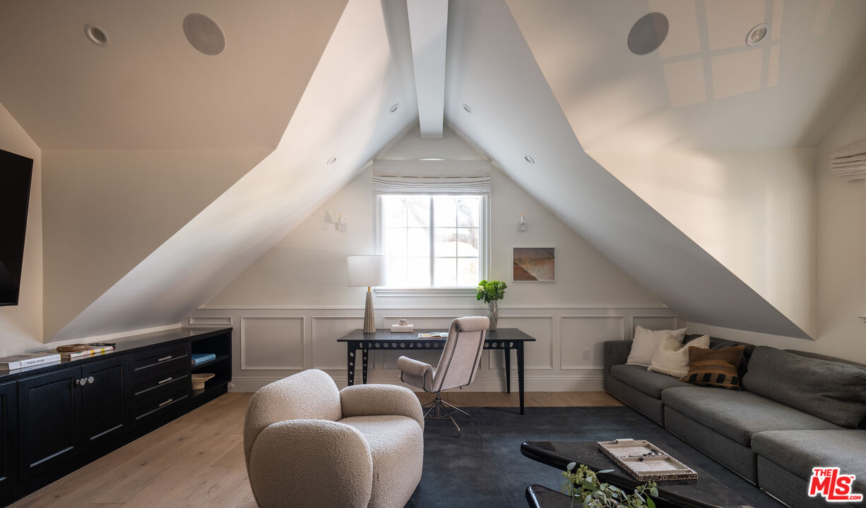 17204 Rancho Street Encino, CA 91316 - Photo 27 of 30 a workspace with furniture and window