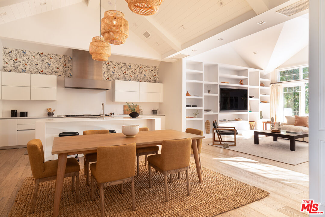 17204 Rancho Street Encino, CA 91316 - Photo 4 of 30 a view of a dining room with furniture