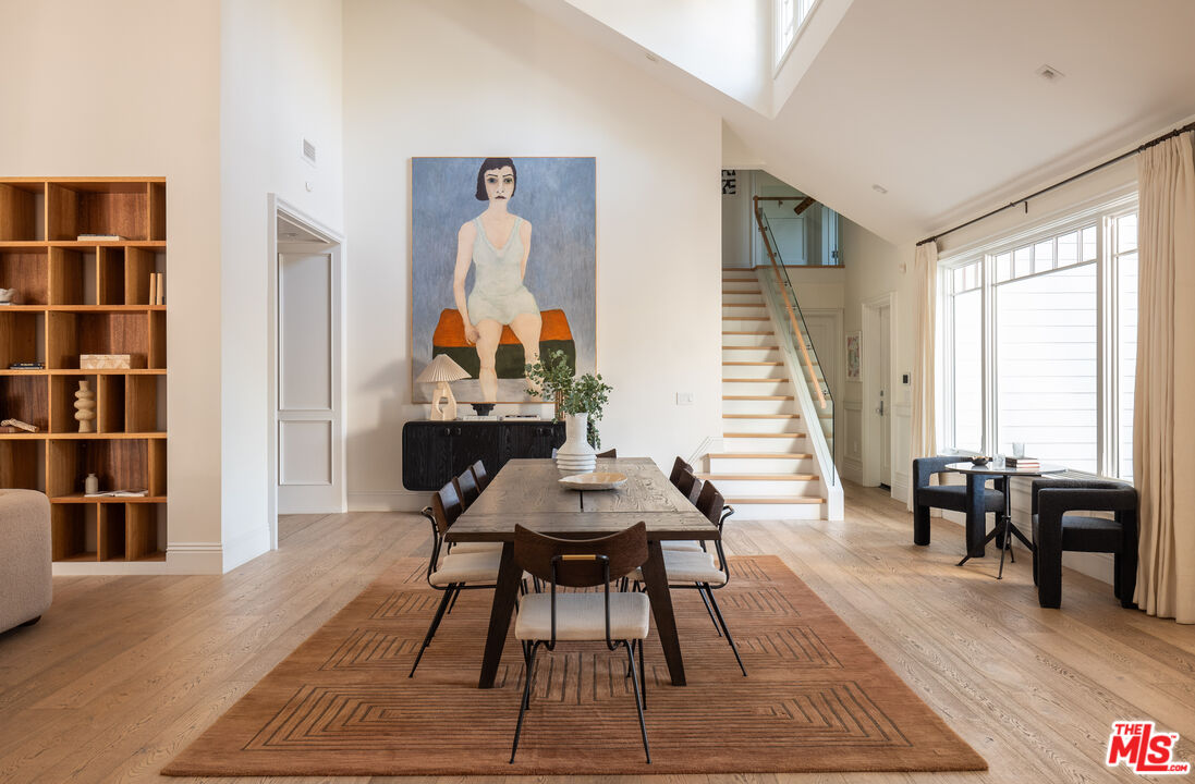 17204 Rancho Street Encino, CA 91316 - Photo 6 of 30 a view of a dining room with furniture window and wooden floor