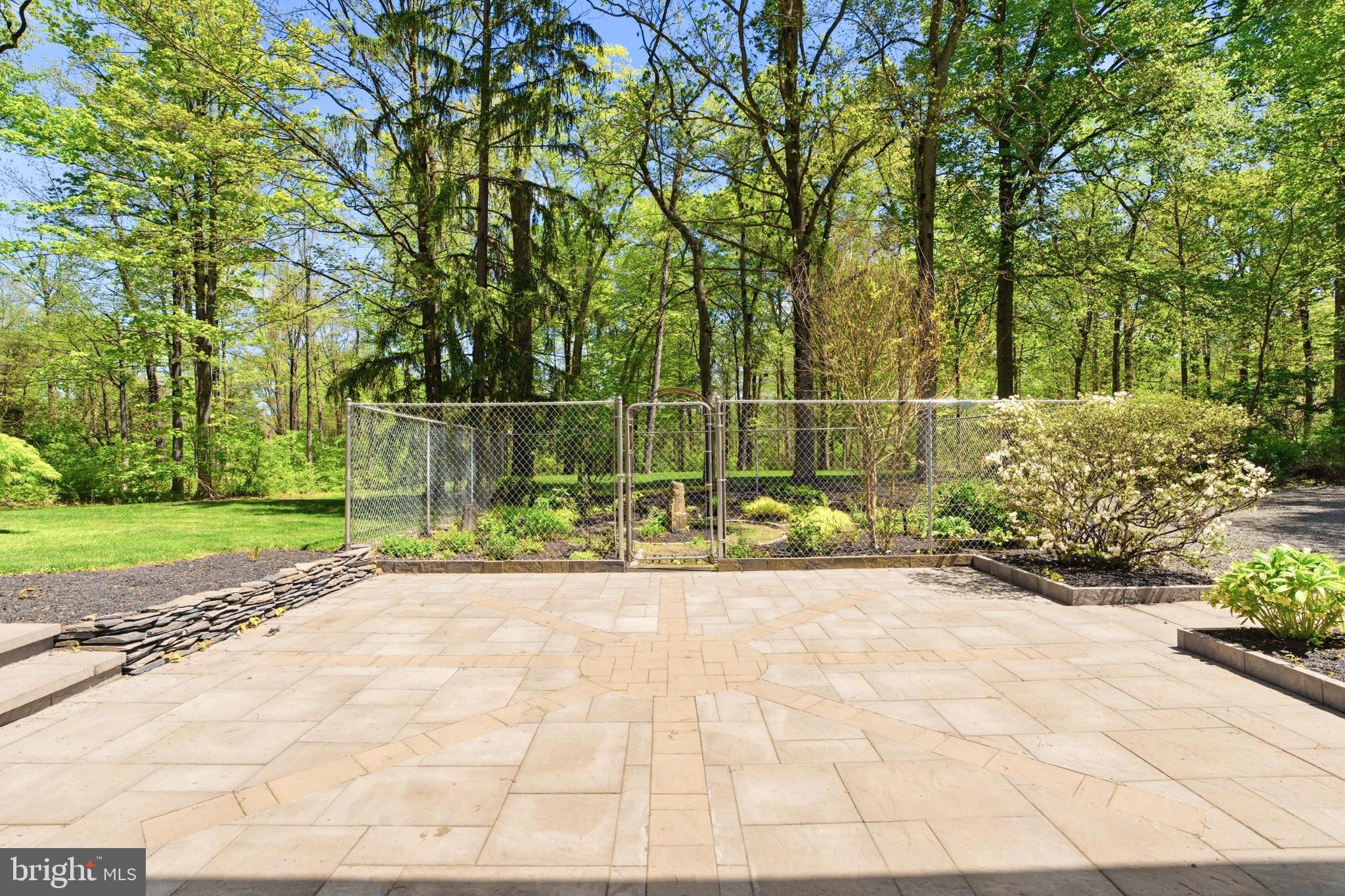 4511 Province Line Road Princeton, NJ 08540 - Photo 26 of 34 a view of a garden with a bench