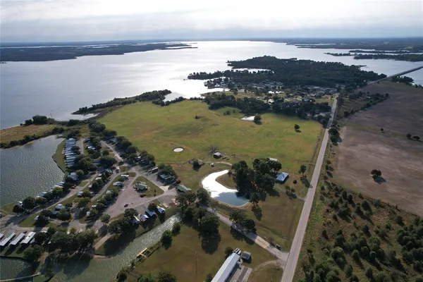 an aerial view of water body with boats