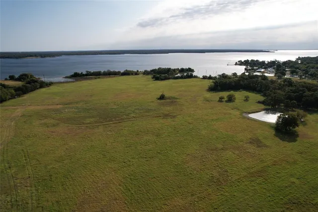a view of a ocean with boats in it