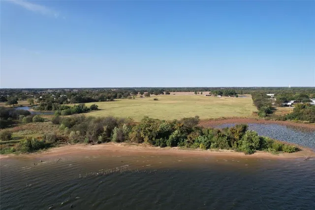 an aerial view of beach and ocean