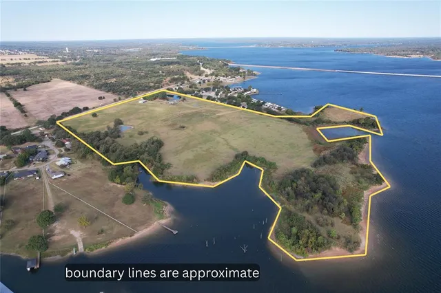 an aerial view of residential house with outdoor space