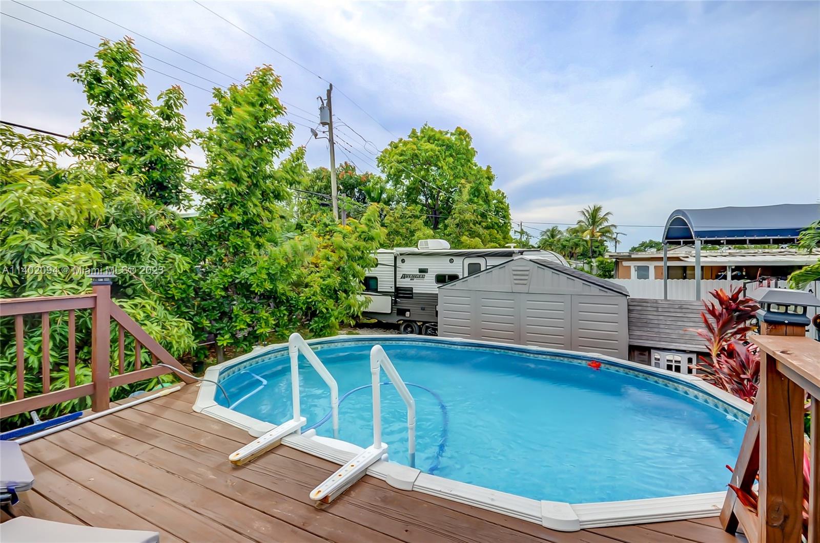 4260 Southwest 99th Avenue Miami, FL 33165 - Photo 20 of 36 a balcony with wooden floor and city view