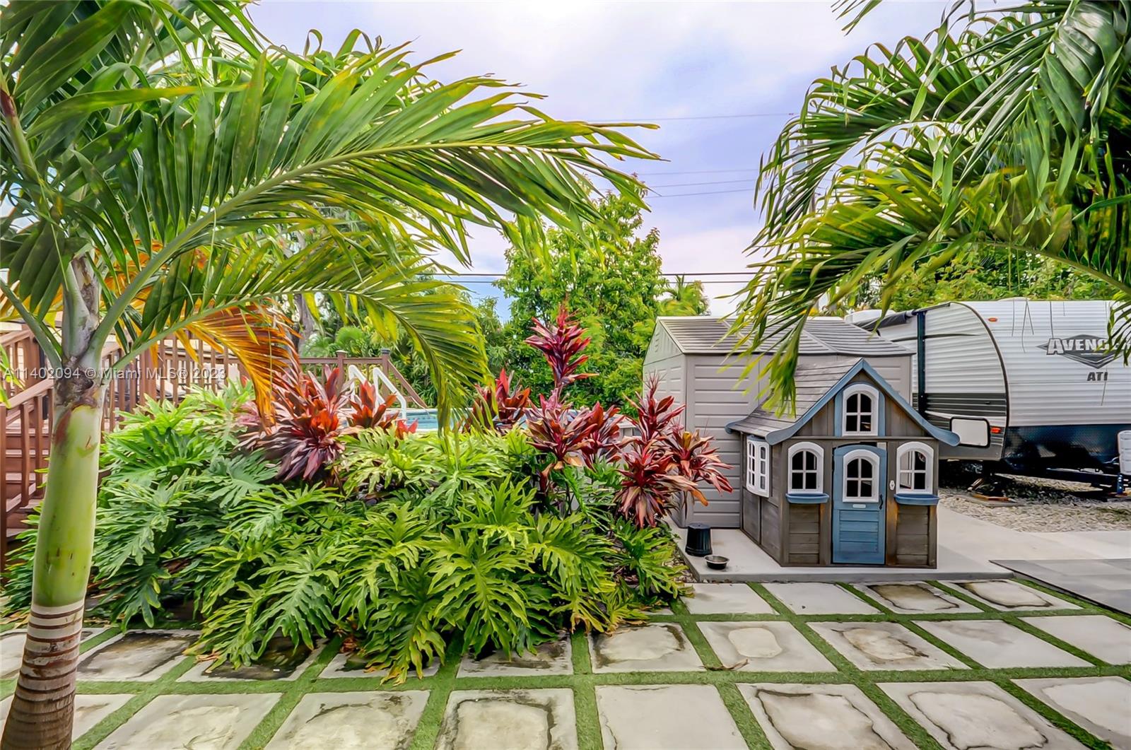 4260 Southwest 99th Avenue Miami, FL 33165 - Photo 24 of 36 a view of houses with an outdoor space