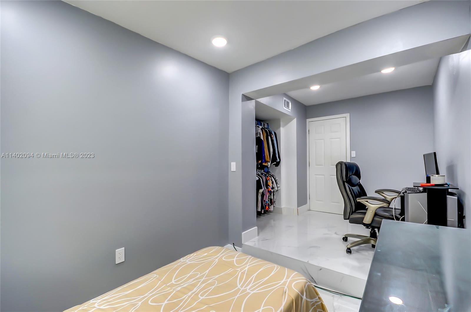 4260 Southwest 99th Avenue Miami, FL 33165 - Photo 9 of 36 a view of a workspace with furniture and a workspace
