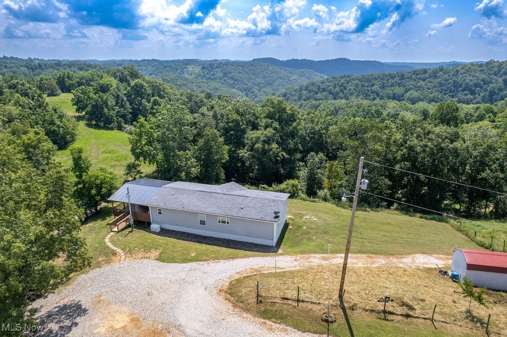 560 Wine Road Elizabeth, WV 26143 - Photo 41 of 50 View of subject property featuring a heavily wooded area