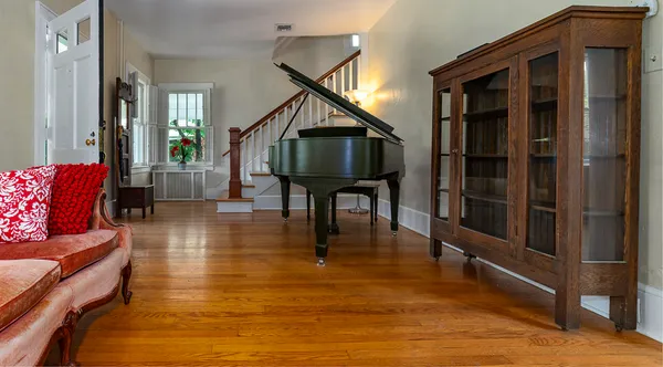 a living room with furniture and a fireplace