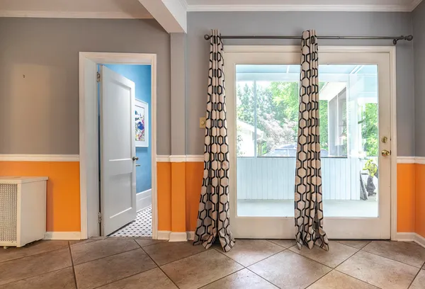 a bathroom with a sink a toilet a mirror and shower