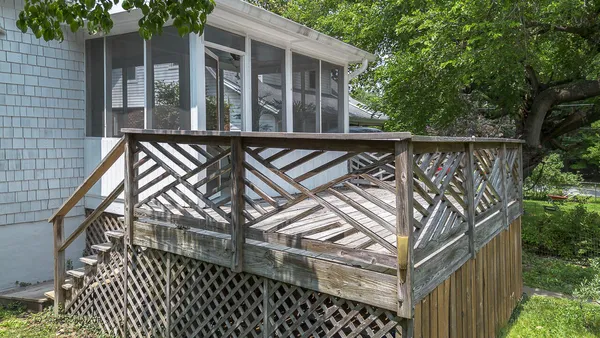 an aerial view of house with a yard and outdoor space