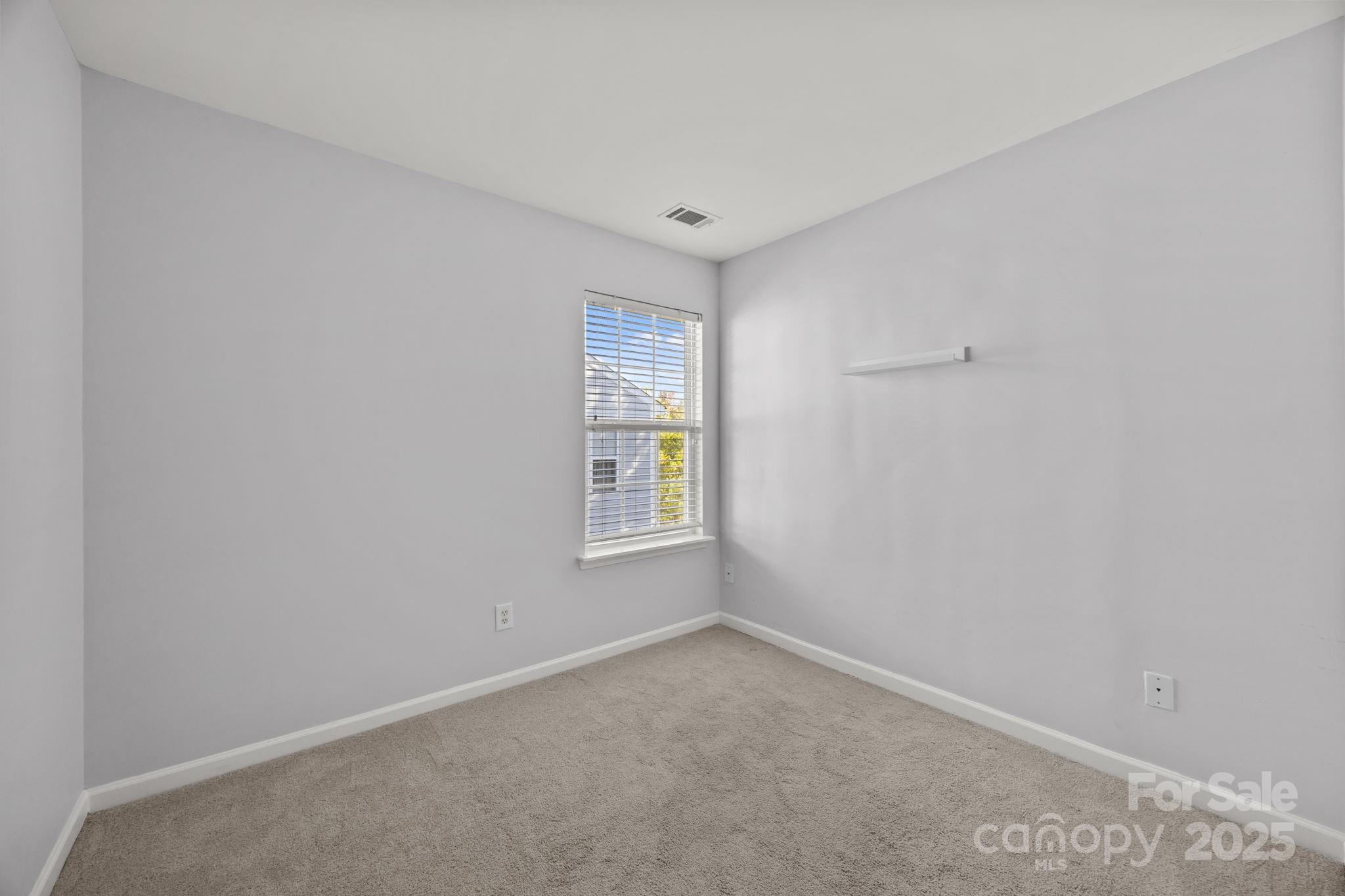 218 Tail Race Lane Fort Mill, SC 29715 - Photo 24 of 42 a view of an empty room with a window