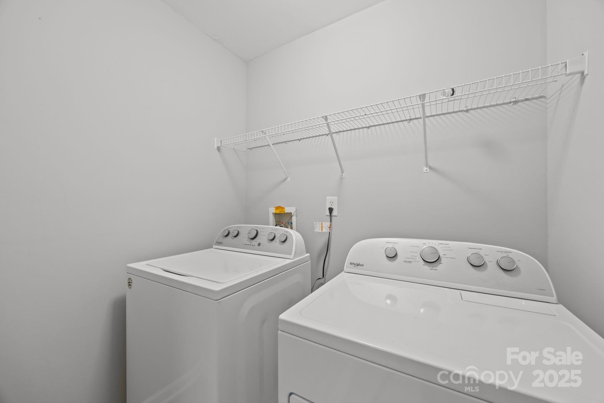 218 Tail Race Lane Fort Mill, SC 29715 - Photo 26 of 42 a utility room with dryer and washer