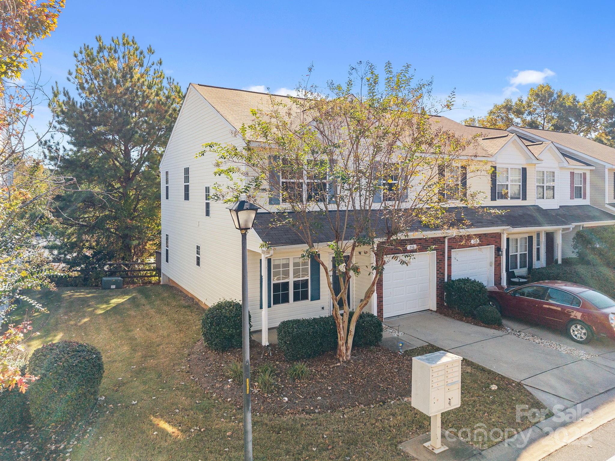 218 Tail Race Lane Fort Mill, SC 29715 - Photo 40 of 42 a front view of a house with a yard