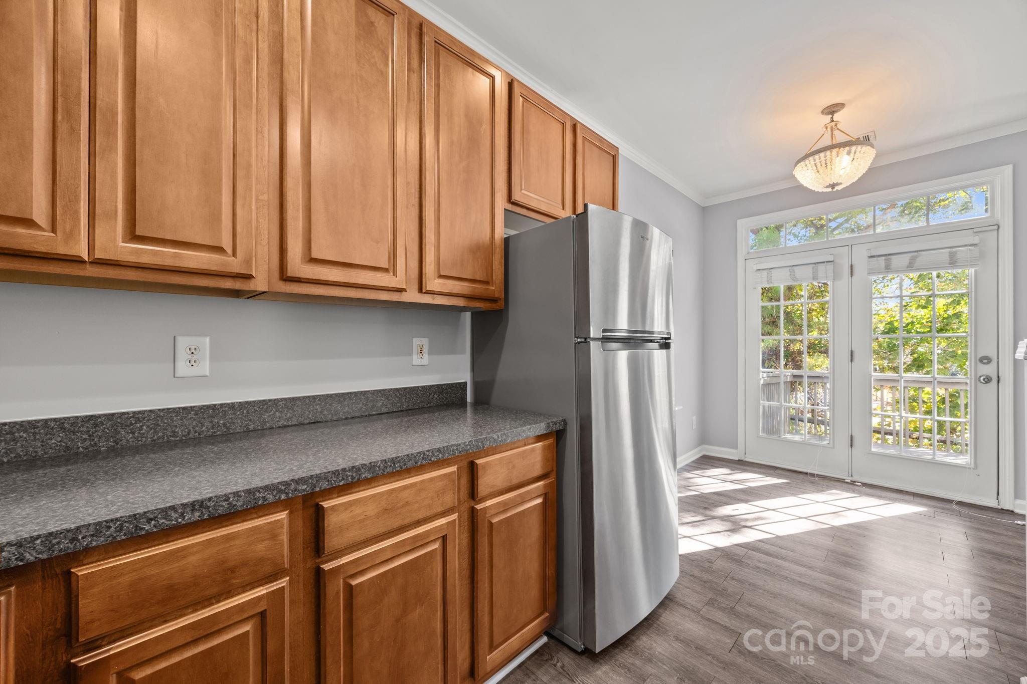 218 Tail Race Lane Fort Mill, SC 29715 - Photo 6 of 42 a kitchen with stainless steel appliances granite countertop a refrigerator and a sink
