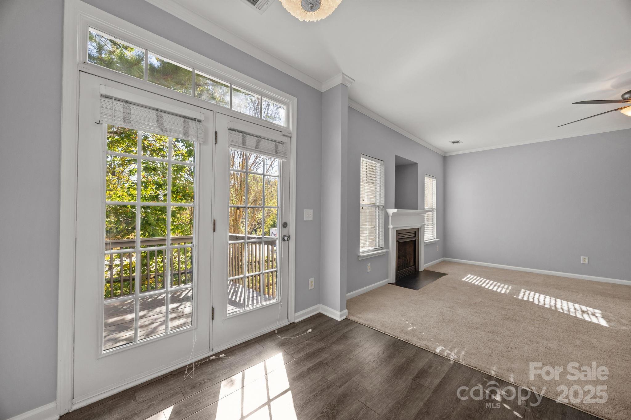 218 Tail Race Lane Fort Mill, SC 29715 - Photo 9 of 42 a view of livingroom with furniture window and front door