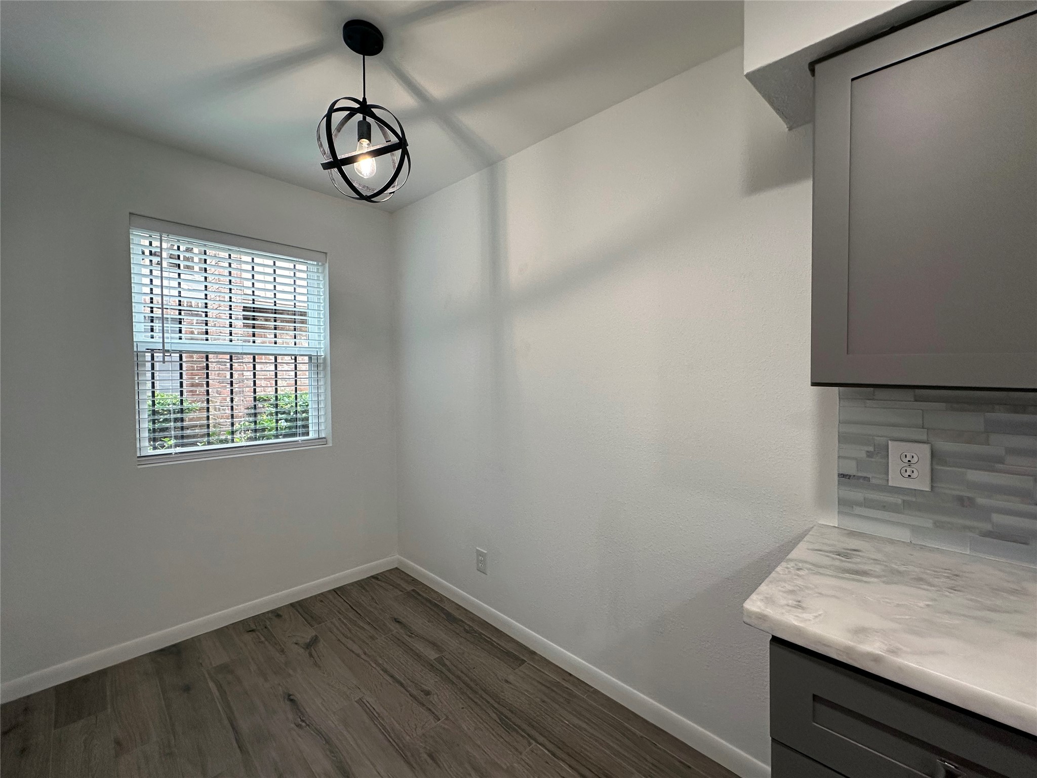 5528 Beverly Hill Street, Unit 3 Houston, TX 77056 - Photo 17 of 50 a view of entryway with wooden floor