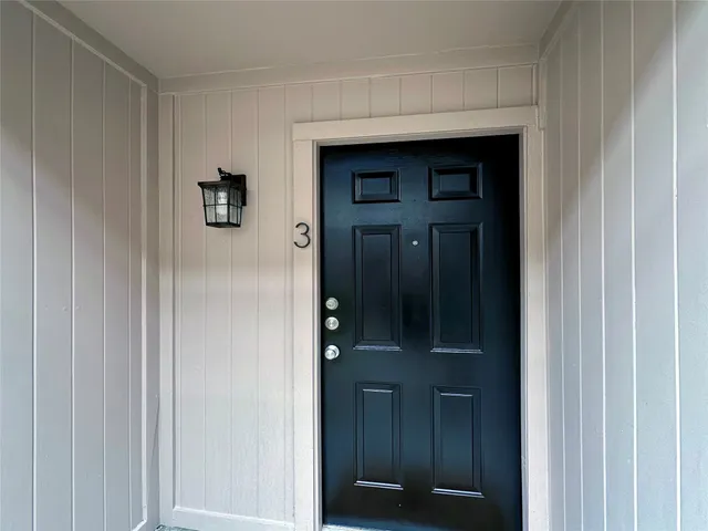 a view of elevator with hallway