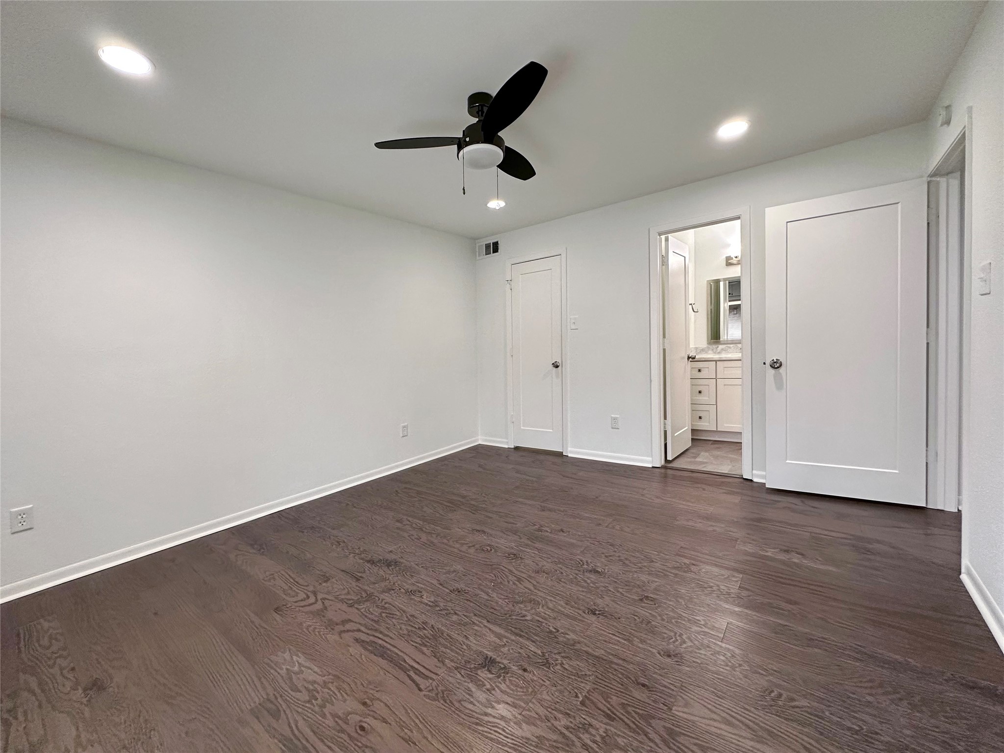 5528 Beverly Hill Street, Unit 3 Houston, TX 77056 - Photo 43 of 50 a view of empty room with wooden floor