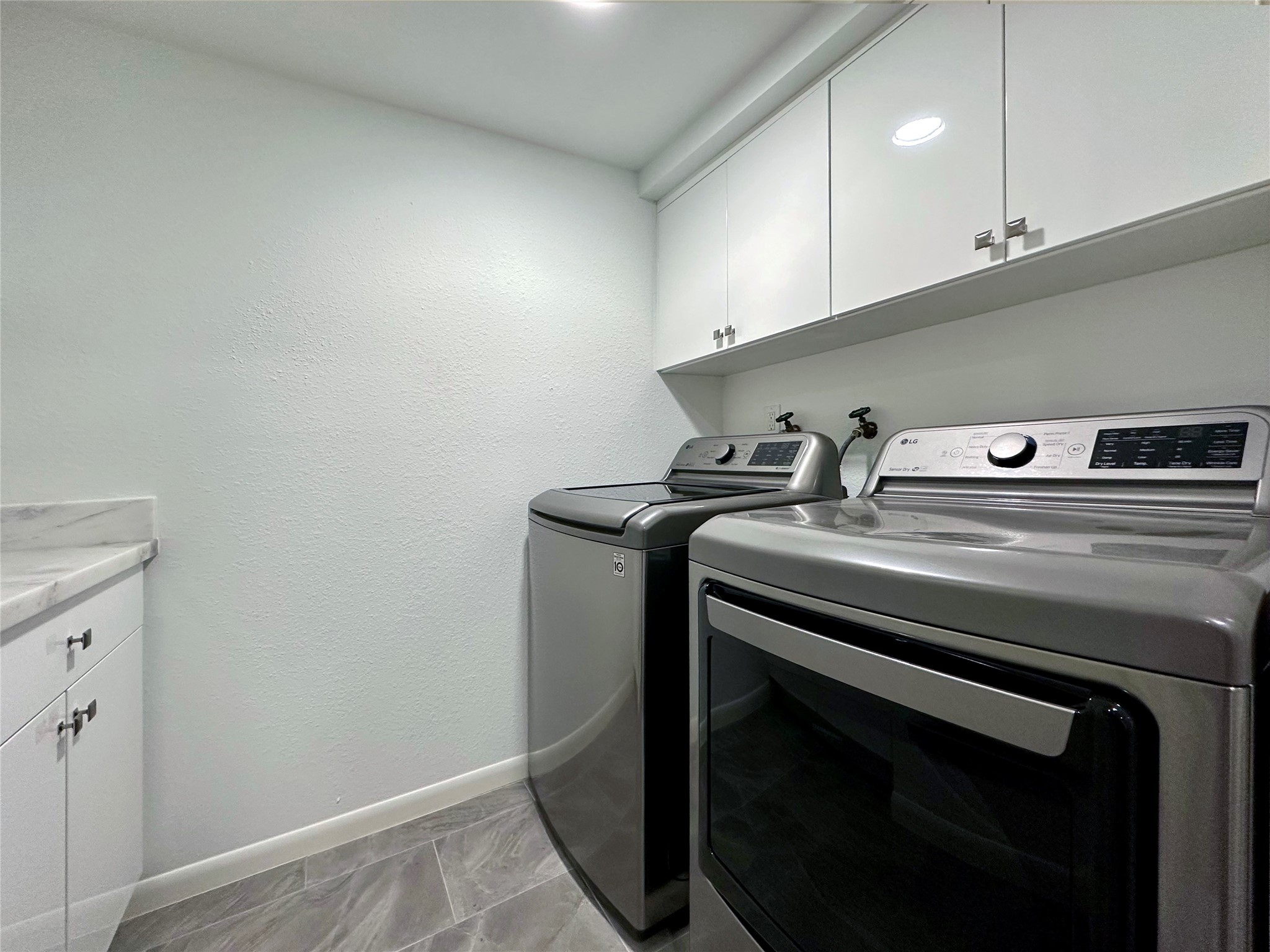 5528 Beverly Hill Street, Unit 3 Houston, TX 77056 - Photo 46 of 50 a close view of utility room and sink