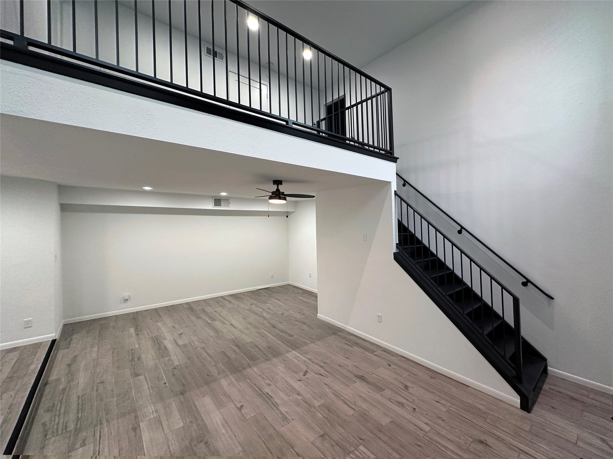 5528 Beverly Hill Street, Unit 3 Houston, TX 77056 - Photo 10 of 50 a view of entryway with wooden floor