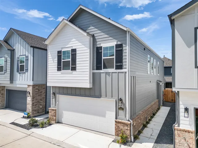a front view of a house with stairs