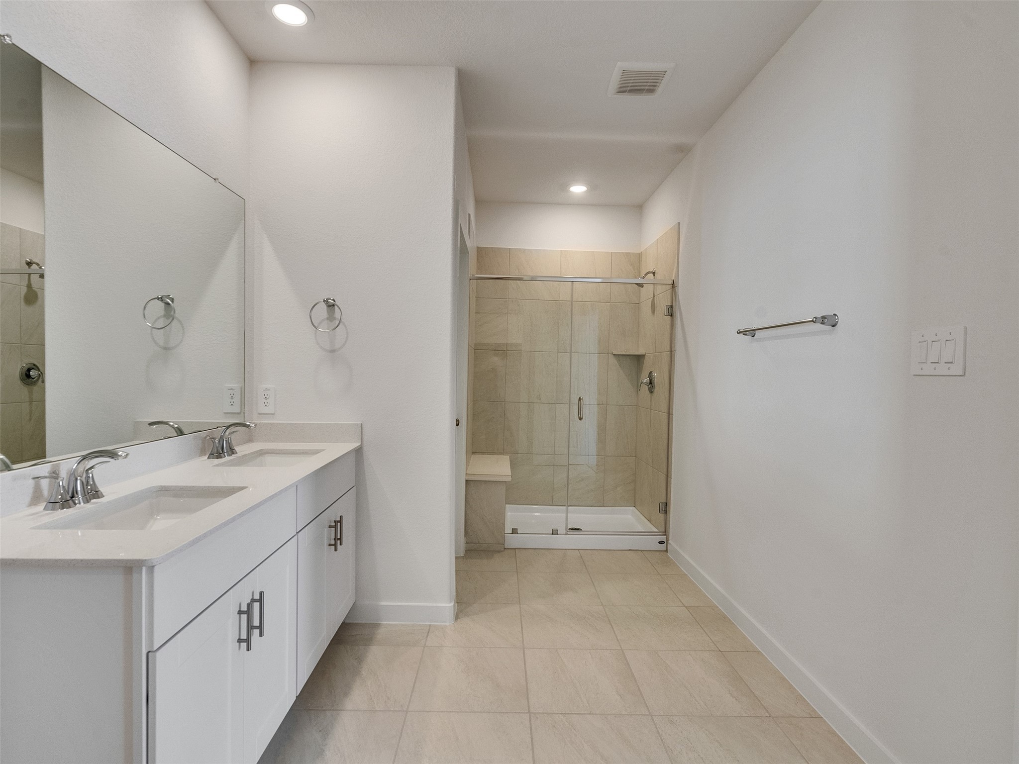 4113 Fig Grv Street Houston, TX 77080 - Photo 18 of 21 a bathroom with a double vanity sink a toilet and shower